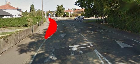 The photo for Green End Road/Nuffield Road mini roundabout going North pinch point.