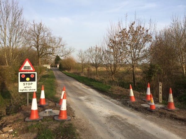 The photo for New Hinxton ford flood barrier will block road to cyclists between Duxford and Hinxton.